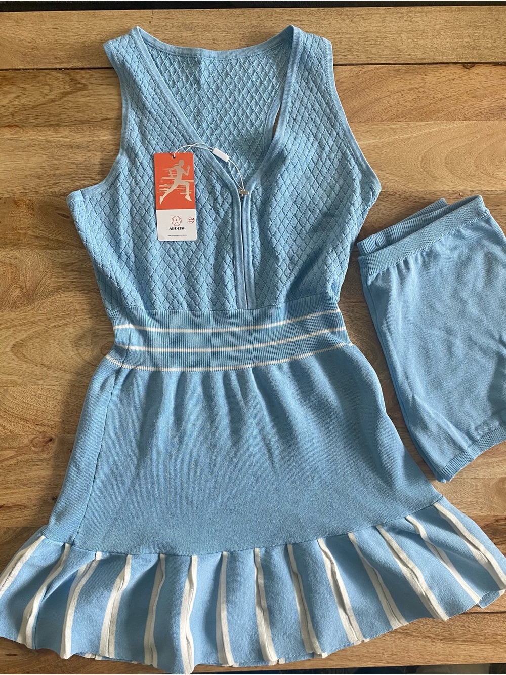Light Blue Sleeveless Knit Tennis Dress with Matching Shorts
